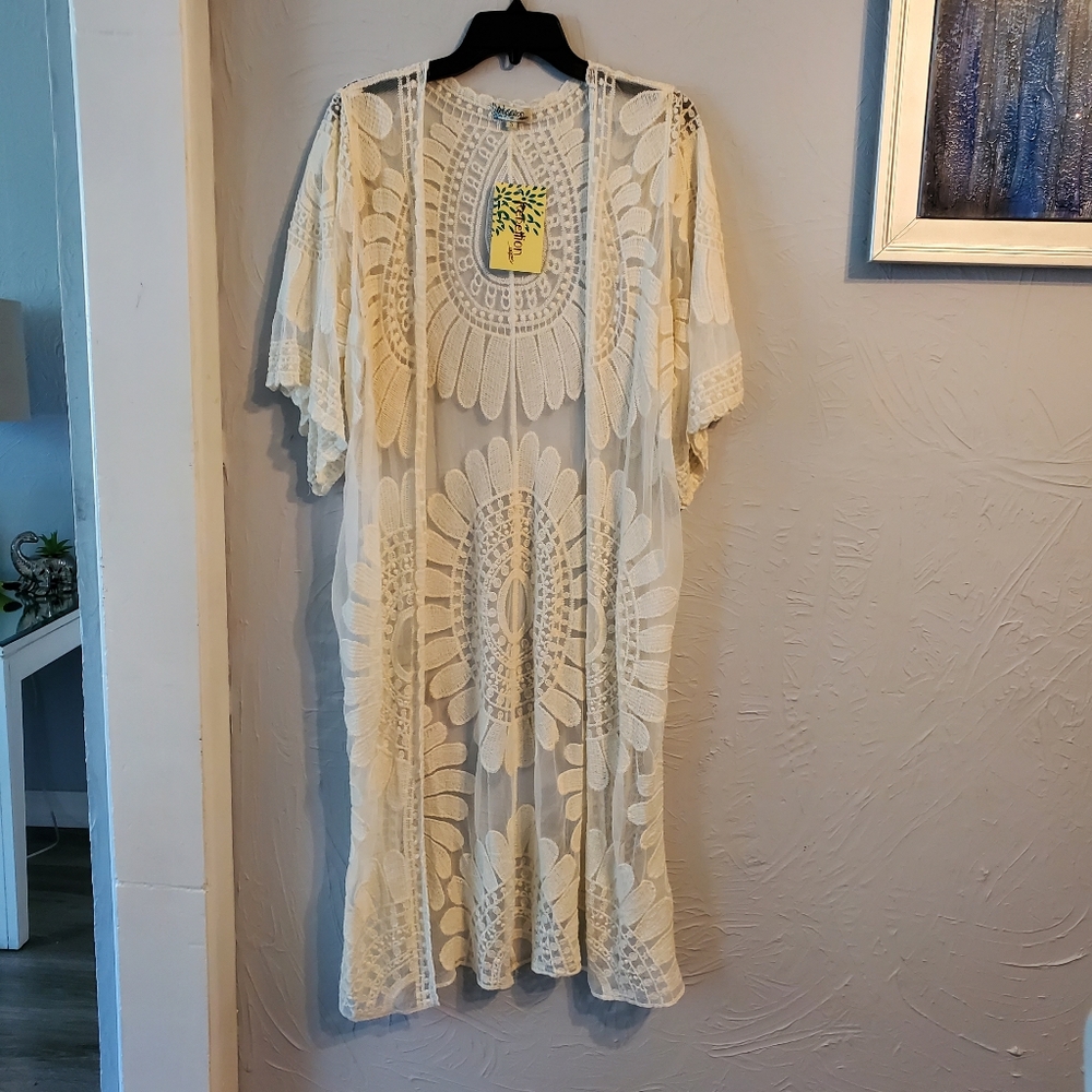 Cardigan bordado color Ivory talla S nuevo
